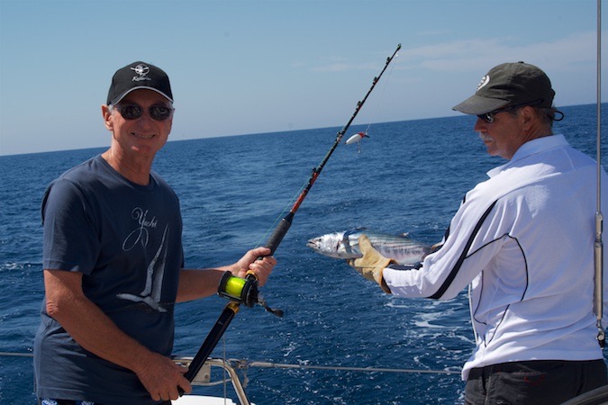 160831 18 Sailing Portimao to Faro Jim Catching fish.jpg