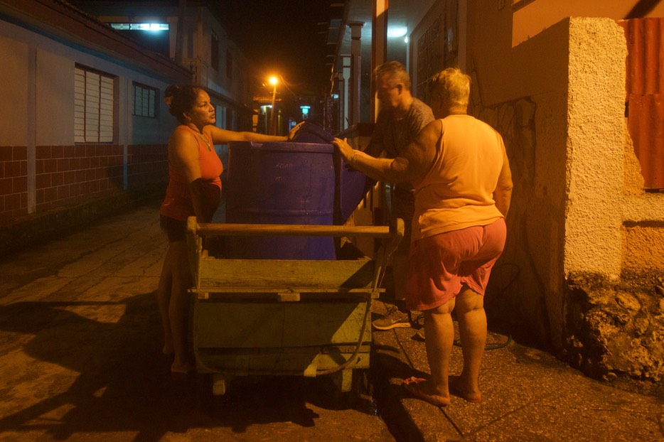 161130 49  Arriving Baracoa Cuba Helping with our water supply