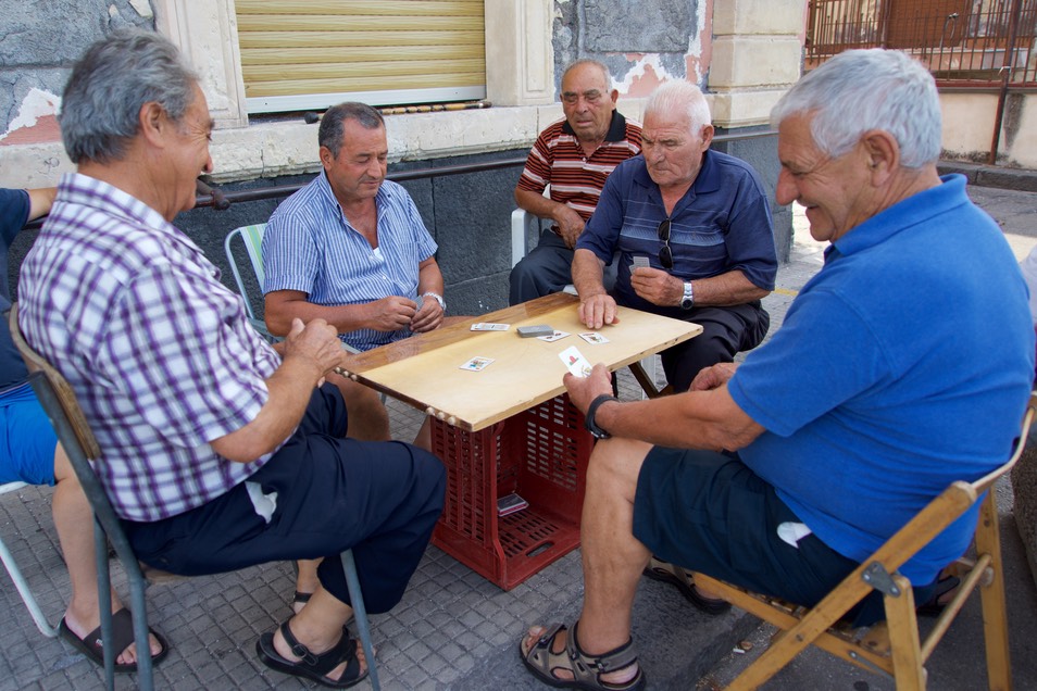 170727 1 The port area of Riposto  Port Di Etna locals card game