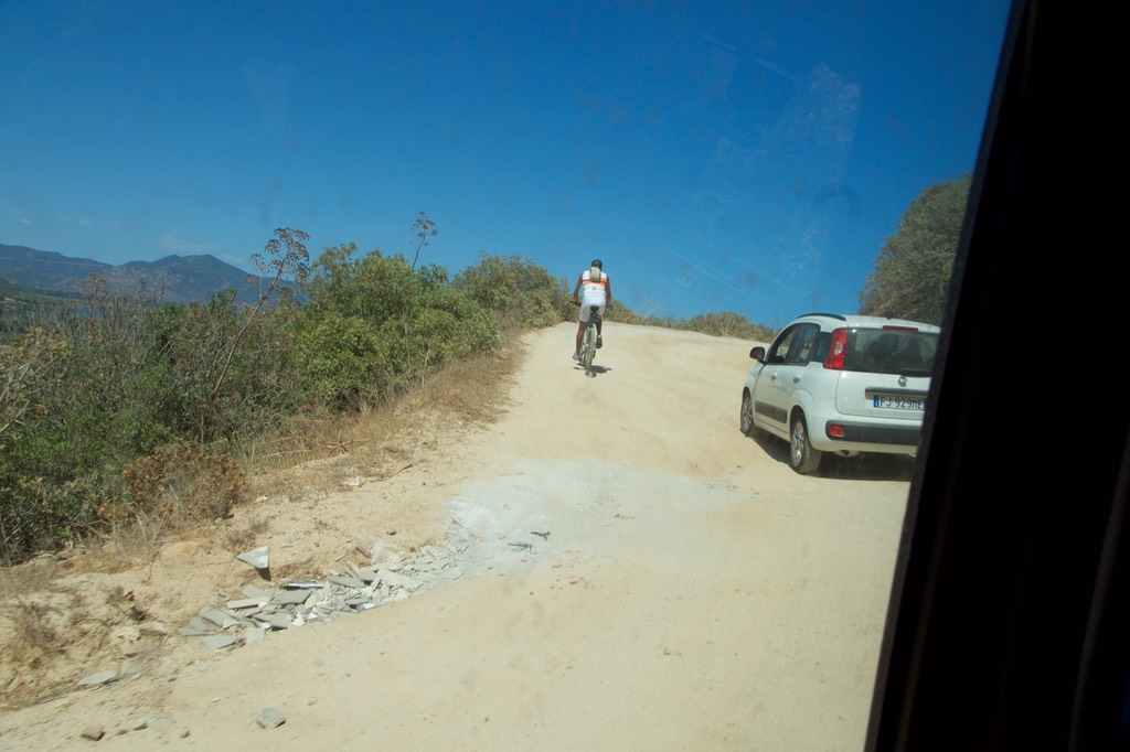 170821 2 The sad moment when a cyclist overtook two pandas uphill on dirt
