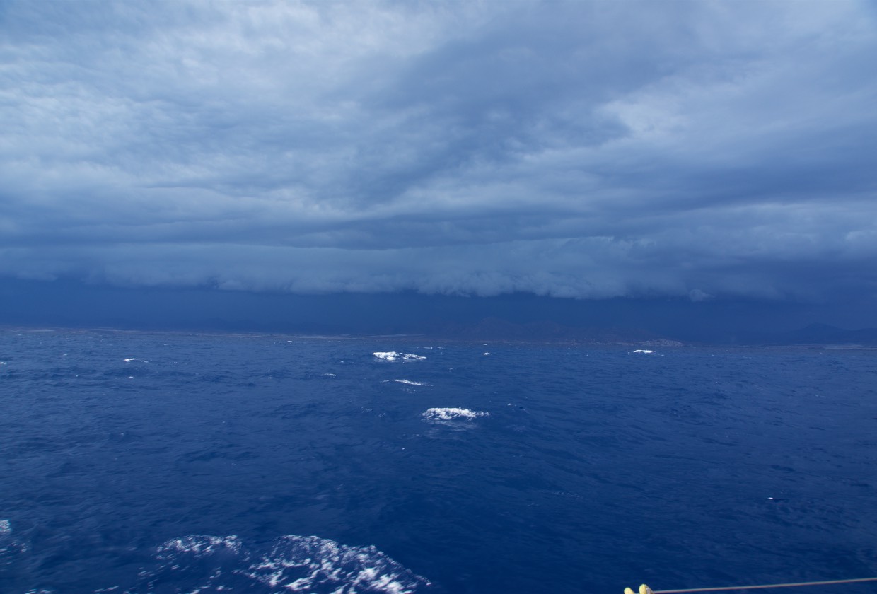 180816 Approaching anchorage near Mazaron Dark Clouds forming