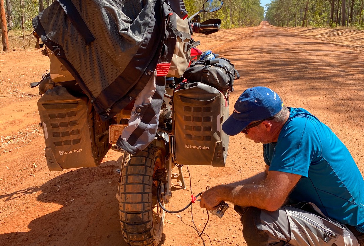 200925 Repairing tyres in the dust dirt and heat not a lot of fun
